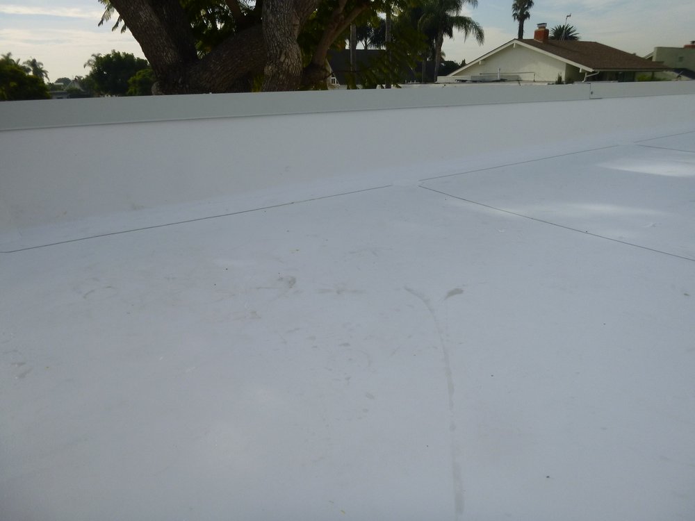 Slide of Shulman Roofing