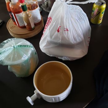 Vien Dong - a cup of coffee and a bag of condiments - Vietnamese Near Me - Spokane, Washington
