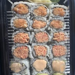 spicy salmon roll , spicy shrimp roll , spicy crab roll spicy salmon roll , spicy shrimp roll , spicy crab roll
