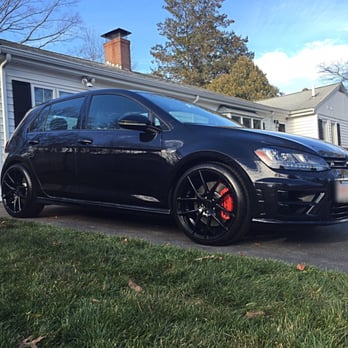 Elite Auto Coatings - Gloss black wheels,  red calipers with carbon fiber R logo. - Auto Detailing Near Me