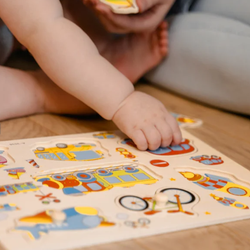 Building Blocks Pediatric Occupational Therapy - Child doing a puzzle, fine motor skills, visual motor skills, attention, matching, gross motor skills, following directions
