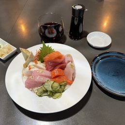 Chirashi selection with delightful Pinot wine accompaniment.