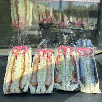 Tres Sandwich - From left to right, spicy chicken curry, shrimp cutlet, matcha ichigo, and black sesame. - Japanese Near Me - Bellevue, Washington Tres Sandwich - From left to right, spicy chicken curry, shrimp cutlet, matcha ichigo, and black sesame. - Japanese Near Me - Bellevue, Washington