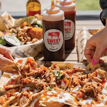 R&R BBQ - a table full of nachos - Barbeque Near Me - Meridian, Idaho R&R BBQ - a table full of nachos - Barbeque Near Me - Meridian, Idaho