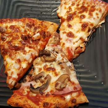 Johnny's Pizza House - Few selections of pizza - Pizza Near Me - Covington, Louisiana