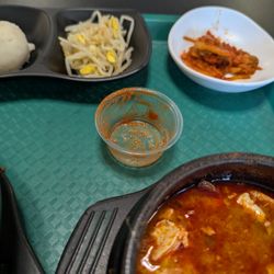 I Luv Tofu & More - Small sauce container. What a rip off now. But staff was very good. Neither were Korean....not that it matters but usually there is one that