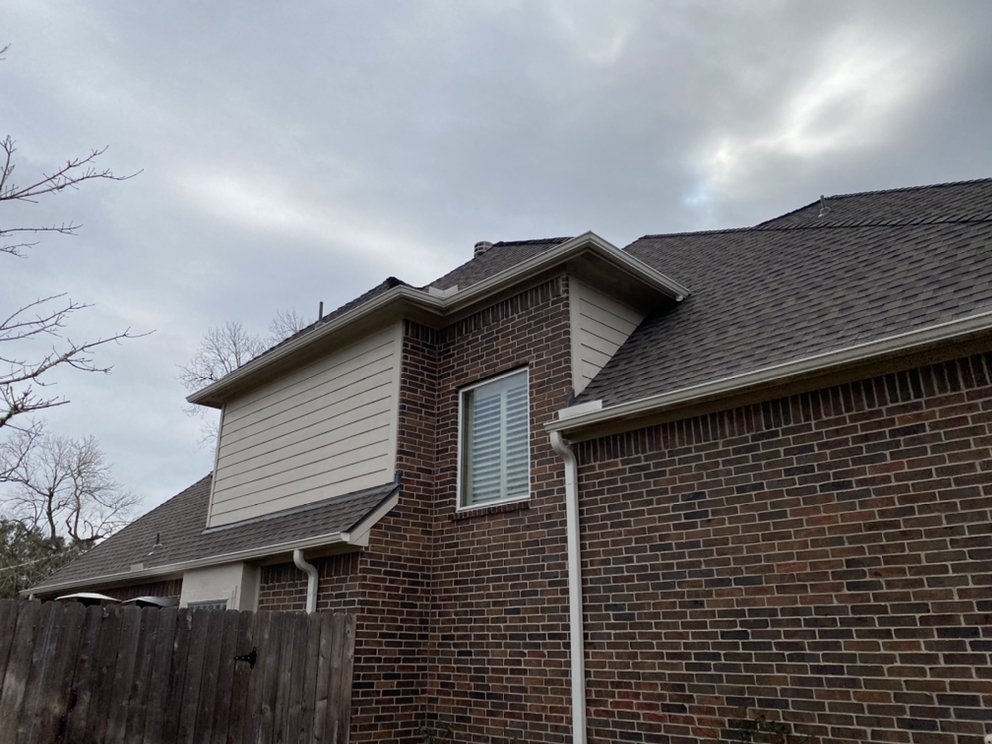 Slide of Redfish Roofing Company