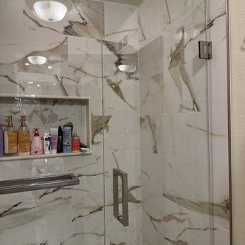 Integrity Shower Glass - Fixed panel and swing door - Glass & Mirrors Near Me - Indian Harbour Beach, Florida Integrity Shower Glass - Fixed panel and swing door - Glass & Mirrors Near Me - Indian Harbour Beach, Florida