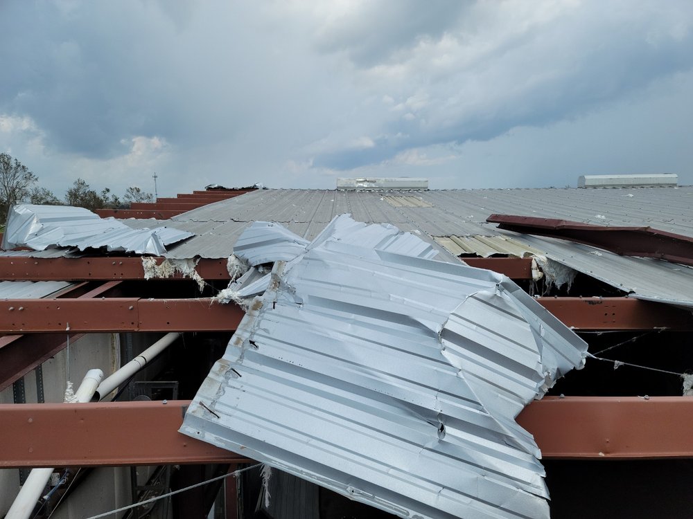 Slide of Inspire Roofing and Construction