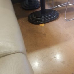a table and chairs in a restaurant a table and chairs in a restaurant
