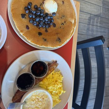The Egg Bistro - Infused Pancakes= blueberries Two Eggs with cheddar cheese Grits with smoked Gouda Applewood Bacon - Breakfast & Brunch Near Me - Virginia Beach, Virginia The Egg Bistro - Infused Pancakes= blueberries Two Eggs with cheddar cheese Grits with smoked Gouda Applewood Bacon - Breakfast & Brunch Near Me - Virginia Beach, Virginia
