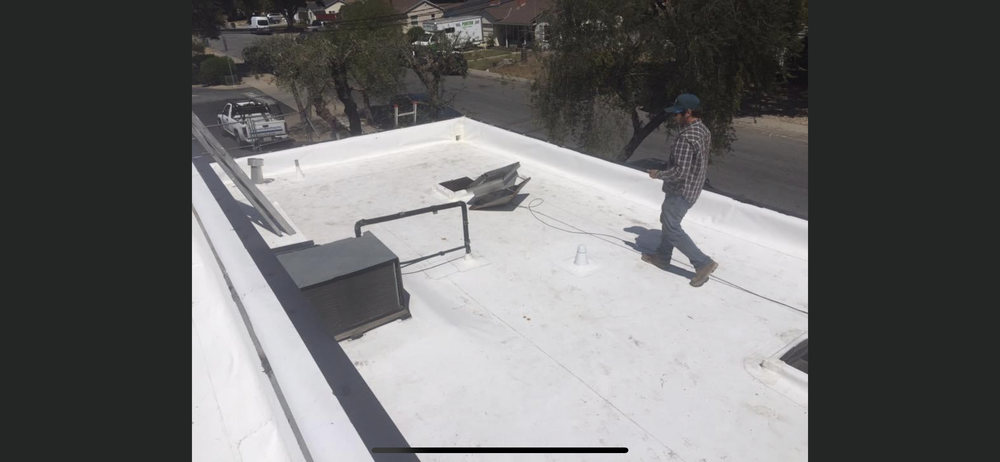 Slide of Riparetti Roofing