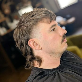 Atomic Barber Co - Textured mullet with low taper--clean edges, natural movement. - Barbers Near Me - Winter Park, Florida
