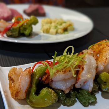 The Butcher Chef - two plates of food on a table - Steakhouses Near Me - Toronto, Ontario