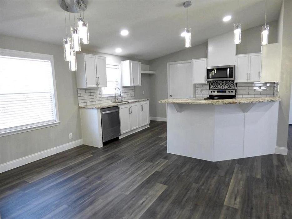 Slide of Solotzo Roofing