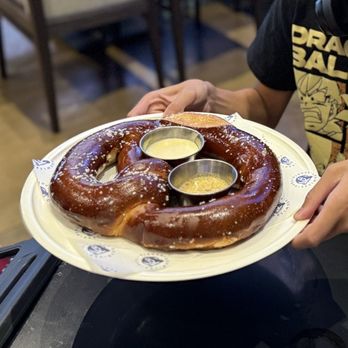 Growlers - Pretzel with cheese & honey dijon dipping sauce - Sports Bars Near Me - Chula Vista, California Growlers - Pretzel with cheese & honey dijon dipping sauce - Sports Bars Near Me - Chula Vista, California