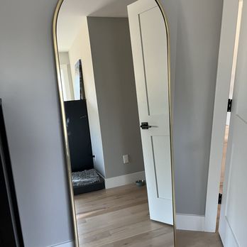 Andrei Sintsov - Secured floor length mirror to wall - Handyman Near Me