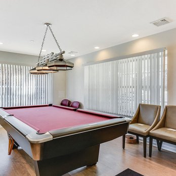 Eagle View Court 55+ Community - Billiards room with pool table and seating area - Retirement Homes Near Me - Middle Island, New York Eagle View Court 55+ Community - Billiards room with pool table and seating area - Retirement Homes Near Me - Middle Island, New York