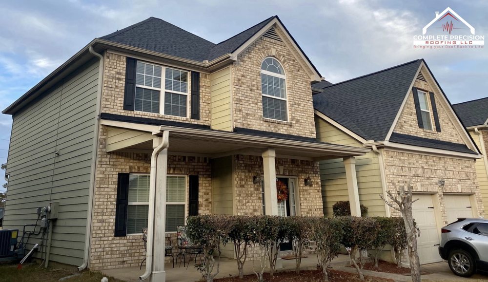 Slide of Complete Precision Roofing