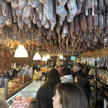 Calabria Pork Store - This sausages drying from the ceiling while they are part of this unique decor! - Meat Shops Near Me - Bronx, New York