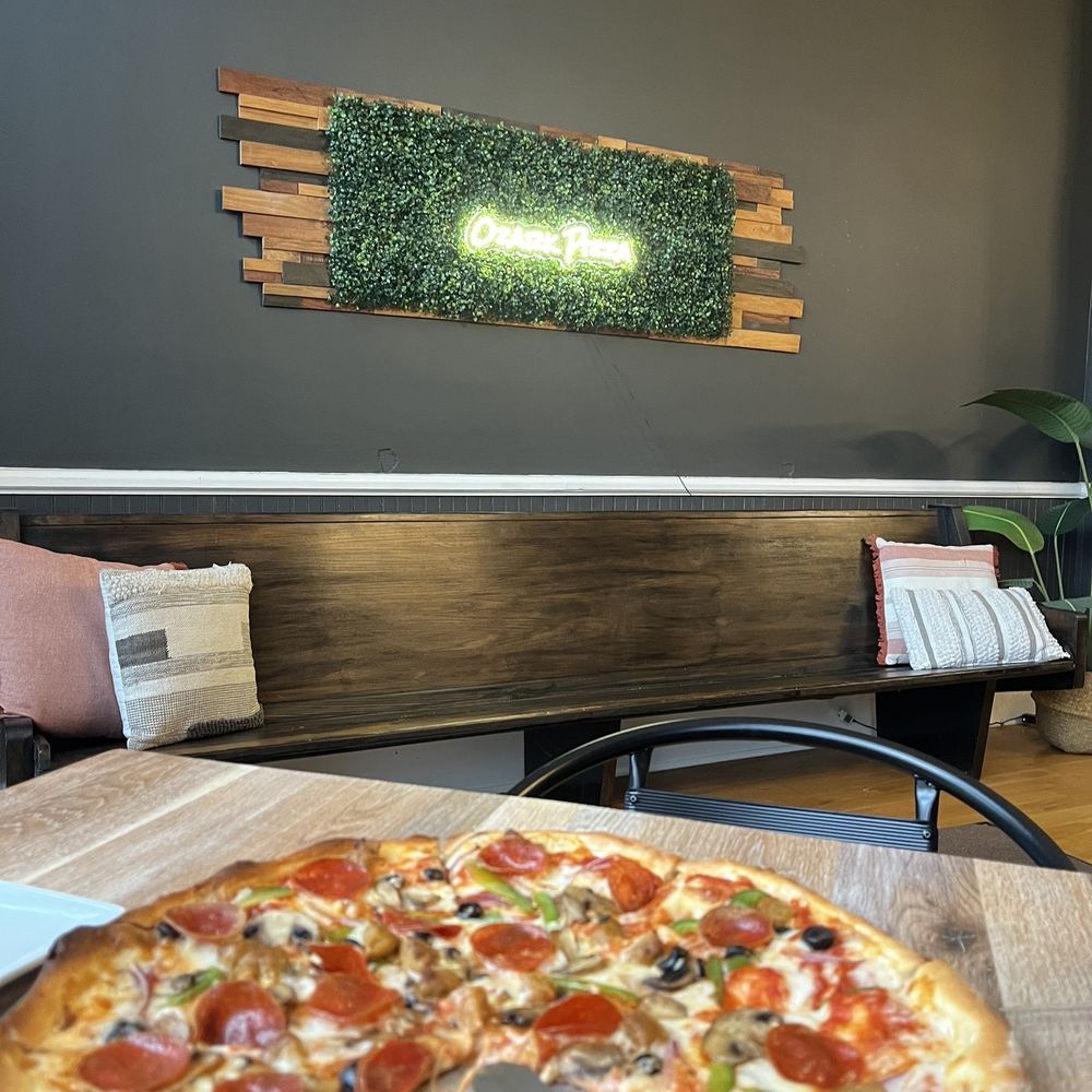 Their Supreme pizza, with 2 slices missing Their Supreme pizza, with 2 slices missing