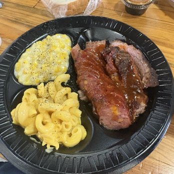 Backwoods BBQ - Brisket and sausage, mac & cheese, and cream corn they give you a cup of beans, not in the picture but very good. - Barbeque Near Me - Fredericksburg, Texas Backwoods BBQ - Brisket and sausage, mac & cheese, and cream corn they give you a cup of beans, not in the picture but very good. - Barbeque Near Me - Fredericksburg, Texas