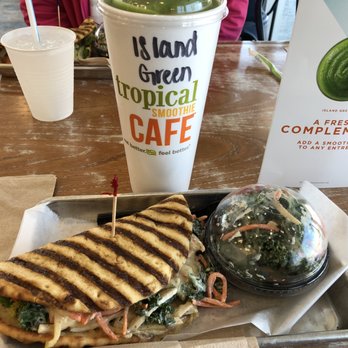 Tropical Smoothie Cafe - Chicken Apple Club flatbread with Kale, Apple Slaw and Island Green Smoothie. Yummy! - Sandwiches Near Me - Fort Myers, Florida Tropical Smoothie Cafe - Chicken Apple Club flatbread with Kale, Apple Slaw and Island Green Smoothie. Yummy! - Sandwiches Near Me - Fort Myers, Florida