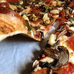 Boardwalk Pizzeria - Large slices and super delicious.