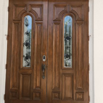 Ron's Painting - We brought the front doors back to life and now they are the focal point to the front of this homes exterior that we also painted. - Painters Near Me - Fort Myers, Florida Ron's Painting - We brought the front doors back to life and now they are the focal point to the front of this homes exterior that we also painted. - Painters Near Me - Fort Myers, Florida