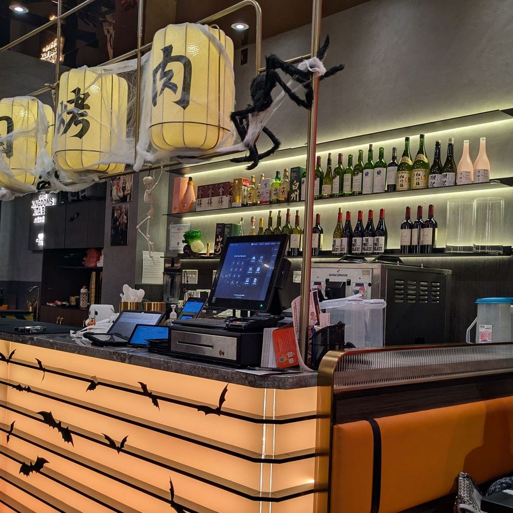 Three Kingdoms Xita BBQ - View of the bar (no seating there but it showcases the alcohol options) - Barbeque Near Me - New York, New York Three Kingdoms Xita BBQ - View of the bar (no seating there but it showcases the alcohol options) - Barbeque Near Me - New York, New York