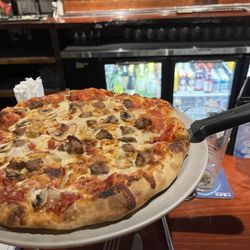 Craft Beer Xchange - Sausage and mushroom pizza