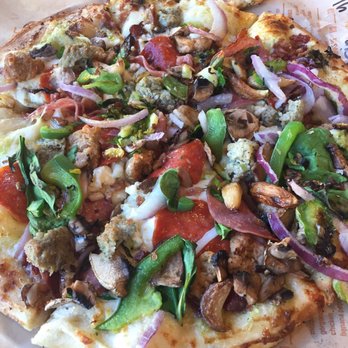 Blaze Pizza - High Rise with Garlic pesto, mozzarella, feta and gargonzola cheese. Italian sausage, pepperoni Mushrooms, bell peppers, spinach, onions - Salad Near Me - Bakersfield, California