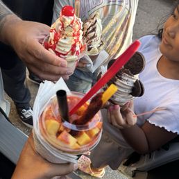 Strawberry sundae. Chocolate sundae. Oreo Monster. Mangoanada w/ Mexican candy straw.
