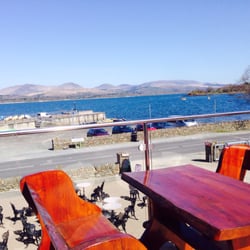 Con's Restaurant - Con's deck is one of the best places in the area to sit outside and hoist a pint.