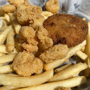 Rusty Pelican - Forgot name of this plate. It had a crab cake, Fried shrimp, & FF. - Sandwiches Near Me - Mandeville, Louisiana Rusty Pelican - Forgot name of this plate. It had a crab cake, Fried shrimp, & FF. - Sandwiches Near Me - Mandeville, Louisiana