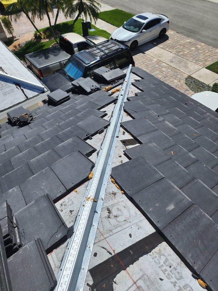 Slide of BMG Roofing