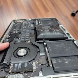 Computer City Repairs - Bad Macbook pro battery. Expanded lithium battery.