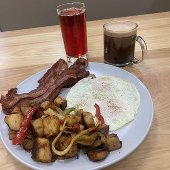 The Breeze Cafe - Classic breakfast with eggs over easy, country potatoes, bacon and an oat milk mocha and cranberry juice. - Breakfast & Brunch Near Me - Newark, California The Breeze Cafe - Classic breakfast with eggs over easy, country potatoes, bacon and an oat milk mocha and cranberry juice. - Breakfast & Brunch Near Me - Newark, California