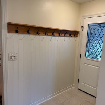 Fixquisite - Cedar wainscoting and solid wood coat rail installed to create a functional and welcoming entry space. - Handyman Near Me - Spokane, Washington Fixquisite - Cedar wainscoting and solid wood coat rail installed to create a functional and welcoming entry space. - Handyman Near Me - Spokane, Washington