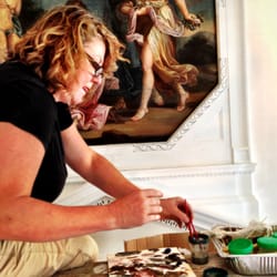 Janet, our painting conservator of 26 years, working on the restoration of 4 paintings on-site in downtown Boston.