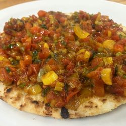 Rancho Mateo Bakery - Arepa con Hogao: Corn cake with onion & tomato
