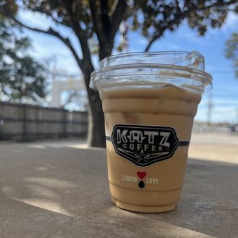 Katz Coffee - a cup of iced coffee on a table - Coffee & Tea Near Me - Houston, Texas Katz Coffee - a cup of iced coffee on a table - Coffee & Tea Near Me - Houston, Texas