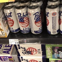 a variety of cans of beer for sale