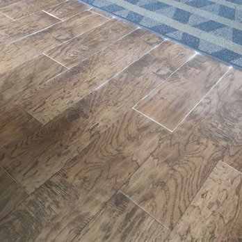 Hilton Garden Inn Longview - Floor is bubbled and fake wood floor is separating. - Hotels Near Me - Longview, Texas