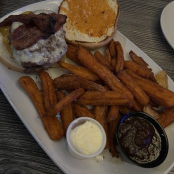 Gecko's Grill & Pub - Million dollar burger with sweet potato fries - Sports Bars Near Me - Sarasota, Florida Gecko's Grill & Pub - Million dollar burger with sweet potato fries - Sports Bars Near Me - Sarasota, Florida
