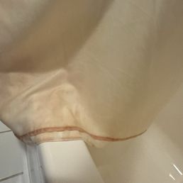 Iron stains on shower curtain Iron stains on shower curtain