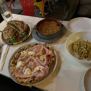 Norma - Clockwise from top left: Cabbucio Caprese, Anelletti Siciliani, Busiate al pesto Trapanese, Pizza Mortadella - Pizza Near Me - New York, New York