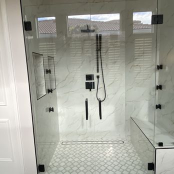 Renovision Kitchen & Bath - Rain shower w/wand and 6-horizontal water jets, seamless glass entry doors, mosaic ceramic sloped floor and two large niches for products. - Countertop Installation Near Me - Royal Palm Beach, Florida