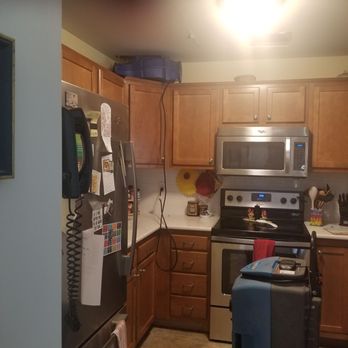 Bath Fitter - Another pic of neighbors kitchen, just before more holes were cut into her ceiling - General Contractors Near Me - Colonie, New York Bath Fitter - Another pic of neighbors kitchen, just before more holes were cut into her ceiling - General Contractors Near Me - Colonie, New York