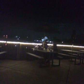 Mucky Duck Pub - A cozy quiet area on a pleasant night overlooking pond - Pubs Near Me - Indianapolis, Indiana